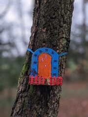 Fototapeta premium Fairy door on a tree in Wiltshire forest