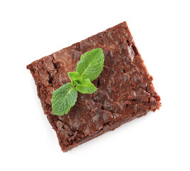 Delicious chocolate brownie with fresh mint leaves on white background, top view