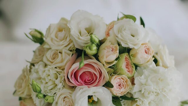 Close-up of a bouquet of fresh flowers lying on the table. Beautiful colors