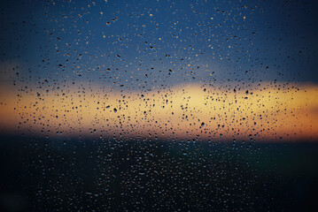 Raindrops on the glass after a thunderstorm