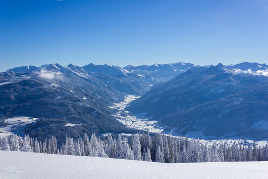 Snow covered winter landscape with fair weather and view to the Untertauern valley in the Radst&auml;dter Tauern, Austria