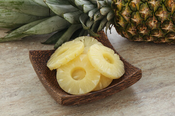 Marinated pineapple rings in the bowl