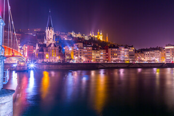 Fototapeta na wymiar St. George Church and buildings around the River Saone, the old town of Lyon, France