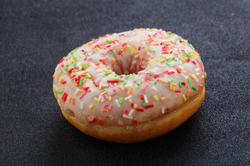 Sweet glazed vanilla donut with icing