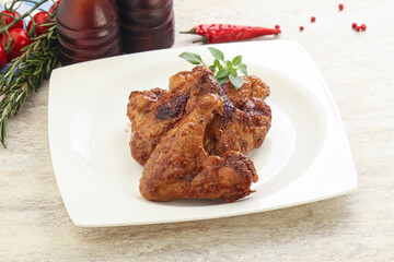Roasted chicken wings with spicy sauce