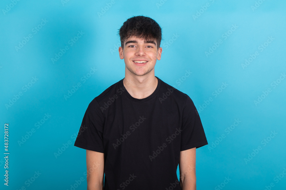 Poster teenager boy isolated on blue background