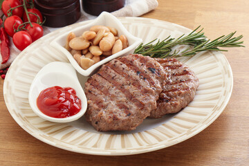 Grilled beef burger cutlet with sauce