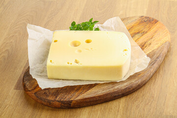 Maasdam cheese over the board