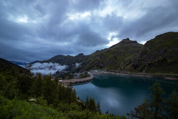 Fototapeta premium Fedaia Stausee, Dolomiten, Südtirol, Italien. Lago di Fedaia, Dolomites, South Tyrol, Italy 