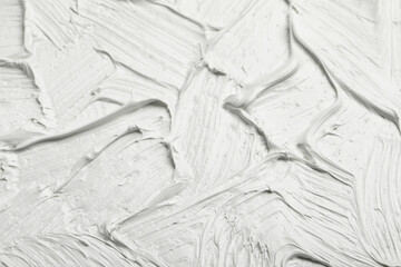 Texture of white oil paint as background, closeup