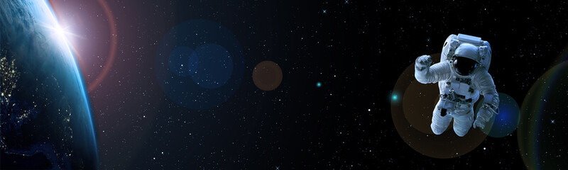 Obraz premium TERRE ET ASTRONAUTE DANS L'ESPACE. Elements of this image furnished by NASA