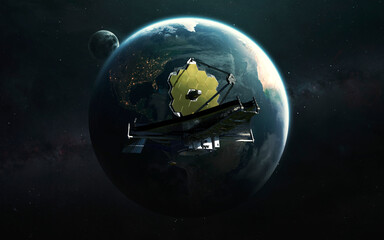 Obraz na płótnie Canvas James Webb telescope on the background of the planet Earth. JWST launch art. Elements of image provided by Nasa