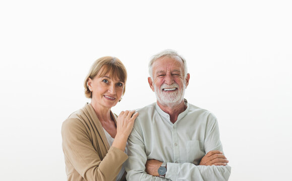 Portrait Of Senior Elderly Couple Smiling With Happiness In White Background.