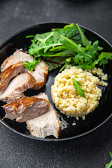 bulgur with meat and leaves lettuce mix fresh portion dietary healthy meal food diet still life snack on the table copy space food background rustic top view keto or paleo diet