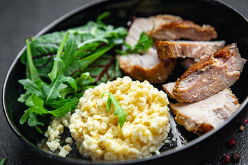 bulgur with meat and leaves lettuce mix fresh portion dietary healthy meal food diet still life snack on the table copy space food background rustic top view keto or paleo diet