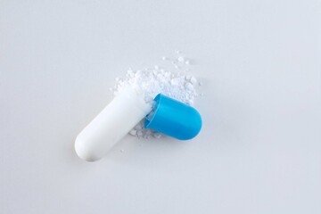 Closeup of the scatter powder from capsule. Isolated pill