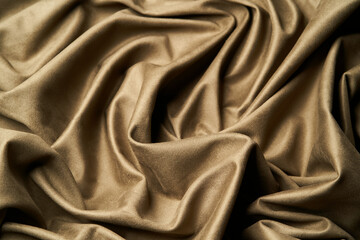 Beige fabric background, view from above