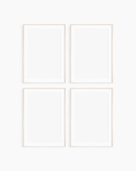 Frame mockup 5x7, 50x70, A4, A3, A2, A1. Set of four thin light wood frames. Gallery wall mockup, set of 4 frames. Clean, modern, minimalist, bright. Portrait. Vertical. Mat opening 2:3.