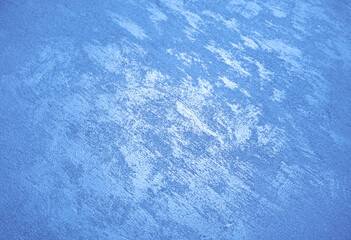 Blue clean and solid background with paint texture.