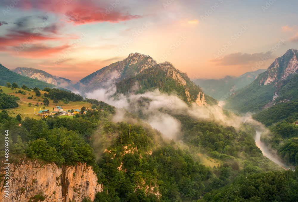 Poster Mountains and sunset sky