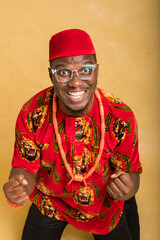Igbo Traditionally Dressed Business Man in Glasses Close up and laugh