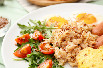 Plate with tasty breakfast, closeup