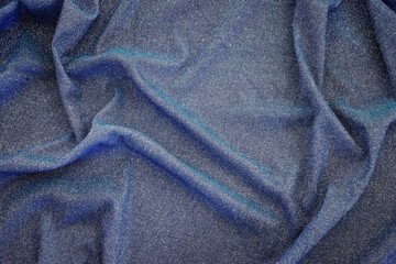 background of beautiful dark blue glitter fabric