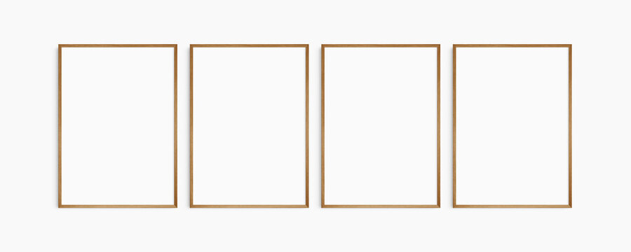 Frame mockup 5x7, 50x70, A4, A3, A2, A1. Set of four thin cherry wood frames. Gallery wall mockup, set of 4 frames. Clean, modern, minimalist, bright. Portrait. Vertical.