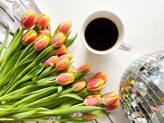 Red-yellow tulips on a light background
