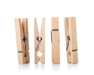 Wooden clothespins on white background