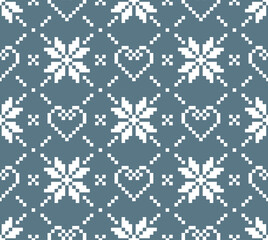 Fototapeta na wymiar Scandinavian knitting seamless pattern design. Nordic star and heart pattern in white and blue.