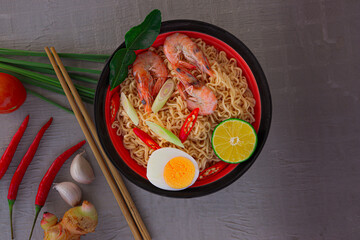 Spicy instant noodles soup with shrimp (tom yum)