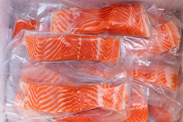 Fresh salmon fillet in vacuum package for delicious salmon menu.