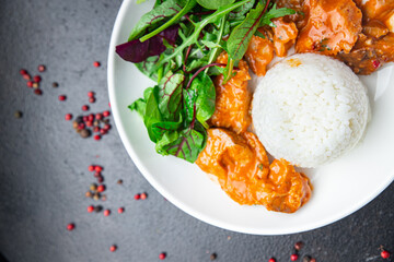 rice meat curry and leaves lettuce mix fresh portion dietary healthy meal food diet still life snack on the table copy space food background rustic top view