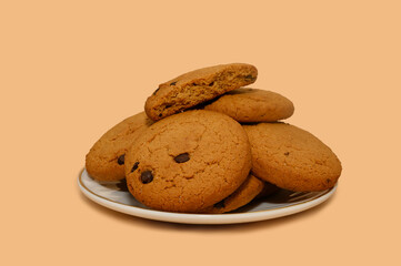 Oatmeal cookies on a white plate. Diet food.