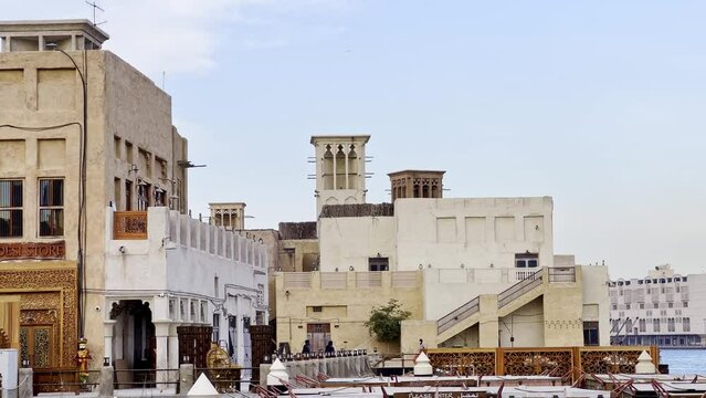 Traditional Buildings With Wind Tower In Al Fahidi Neighbourhood, Dubai, UAE. - wide shot