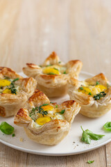 savory puff pastry cups with egg and cheese