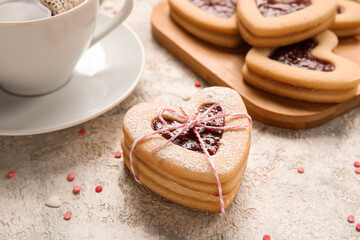 Tasty cookies for Valentine's Day celebration on light background, closeup