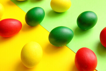 Multicolored Easter eggs on color background