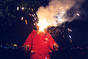 Children set off fireworks during Chinese New Year