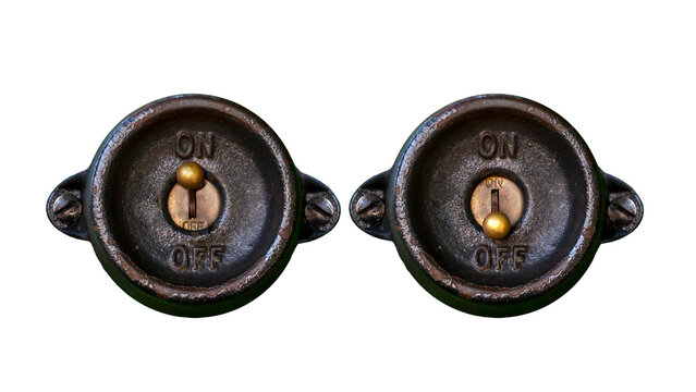 Antique steampunk style metal on-off switch in on and off position isolated on a white background