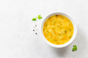 Split pea yellow vegetable soup. Top view, copy space.