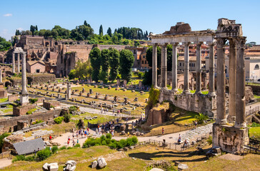 Panorama of Roman Forum Romanum with Temple of Saturn Aedes Saturni and ancient Via Sacra at in historic center of Rome in Italy - obrazy, fototapety, plakaty