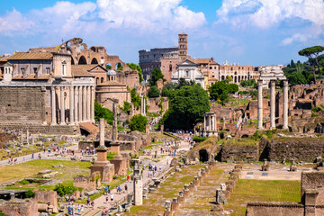 Panorama of Roman Forum Romanum with Temple of Antoninus and Faustina San Lorenzo in Miranda church, Colosseum and Via Sacra in historic center of Rome in Italy