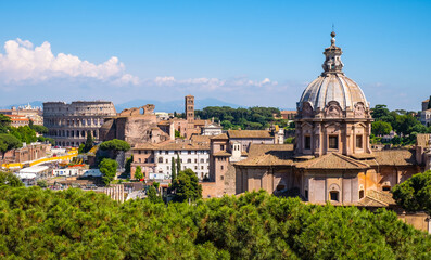 Fototapeta na wymiar Panorama of Roman Forum Romanum with Santi Luca and Martina martyrs church and Colosseum in historic center of ancient Rome in Italy