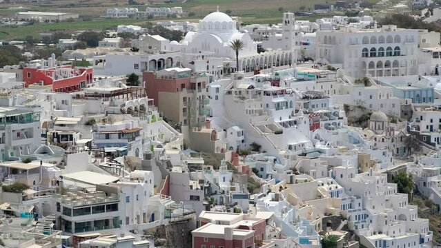 Panoramic view of the whitewashed center of Fira in Santorini Greece