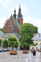 Market square in a small town near Krakow, Collegiate Basilica of St. Andrew the Apostle, Olkusz,...