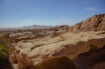 Fototapeta na wymiar The dry arid desert landscape of the Moon Valley in Argentina