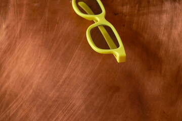 Low-cost yellow Plastic Linear Polarized 3D Glasses for watching 3D movies on the copper...