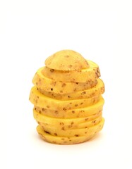 A stack made from sliced raw ripe potatoe on white background.